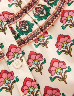 Blouse à empiècement volanté