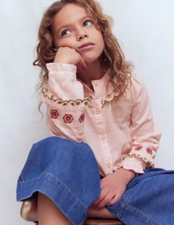 Blouse à empiècement volanté