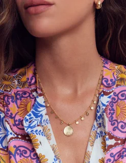 Collier court à rangées de perles