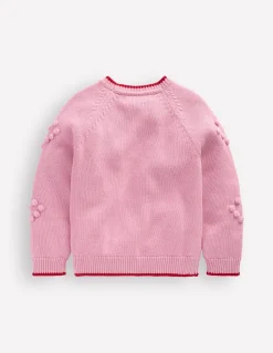 Joli cardigan à pompons