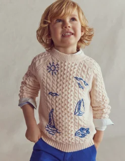 Pull brodé et torsadé