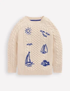 Pull brodé et torsadé