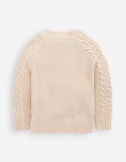 Pull brodé et torsadé