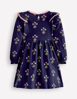 Robe à manches longues et volants