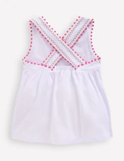 Top à dos croisé détail pompons