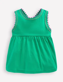 Top à dos croisé détail pompons