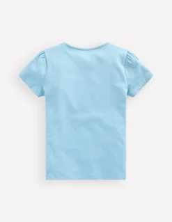 Top à manches bouffantes et super surpiqûres