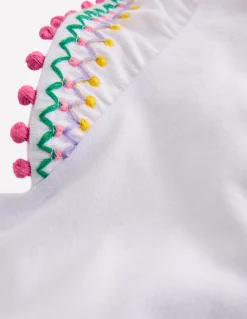 Top à manches virevoltantes et détails