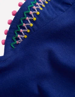 Top à manches virevoltantes et détails