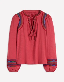 Top brodé à col cranté