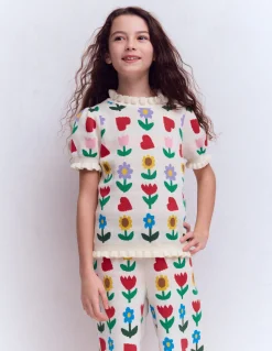 Top en maille à volants