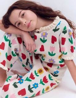 Top en maille à volants